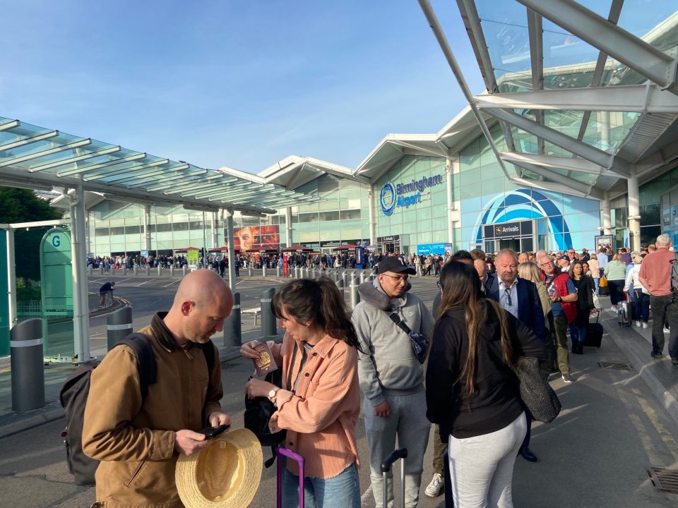 Brits flying through Birmingham were also stuck in huge queues yesterday