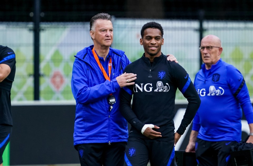 Timber has been warned about his World Cup spot by Dutch coach Van Gaal (L)