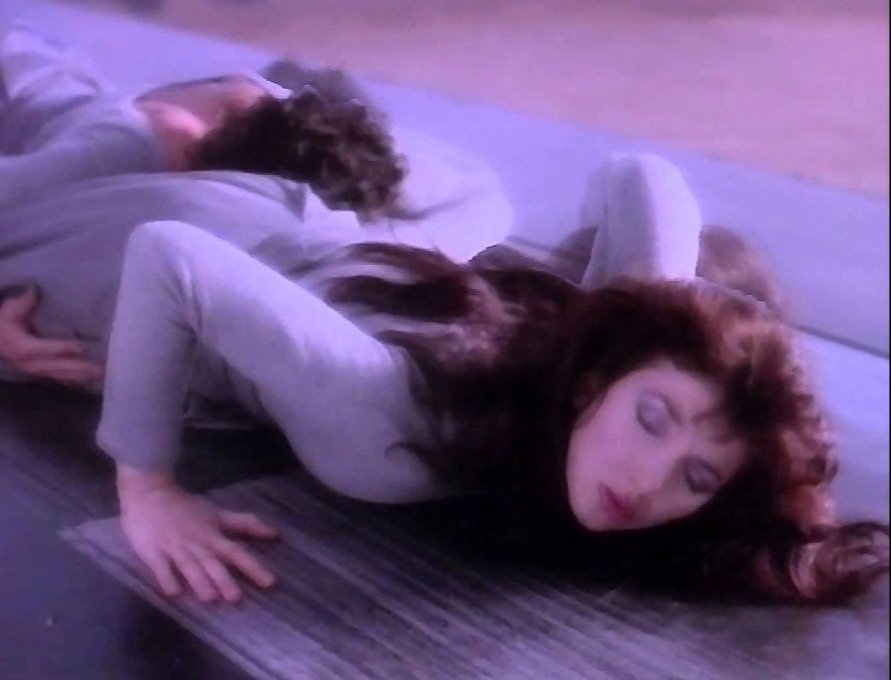 Kate in the 1985 video from Running Up That Hill