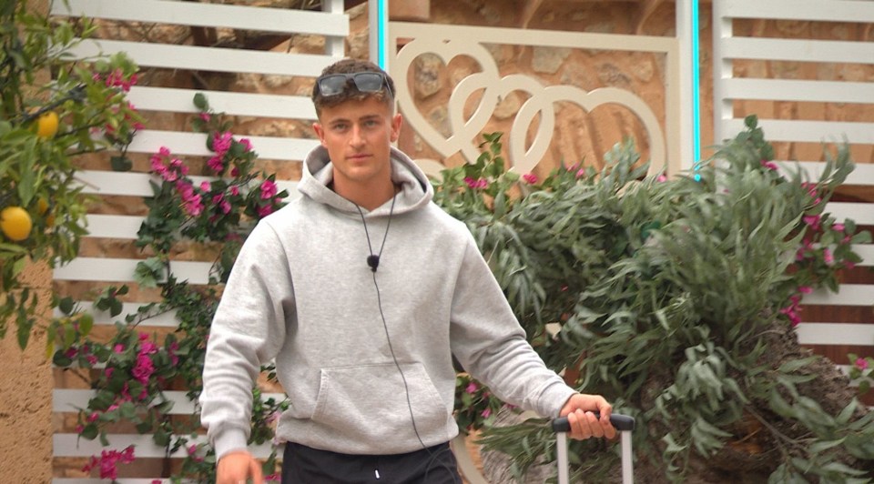 Liam pictured leaving the Love Island villa with his suitcase