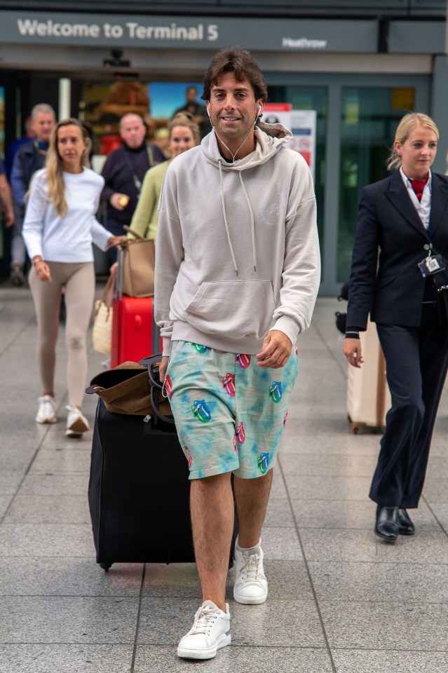James Argent was all smiles walking through the airport on his way to Marbella