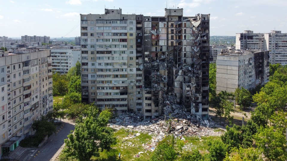 Nearby flats in the city in north-east Ukraine have been smashed by shelling