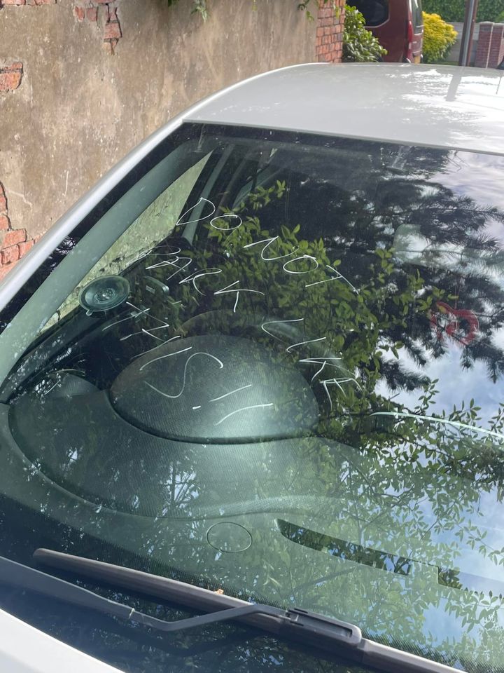 One shocking message was scrawled on her windscreen