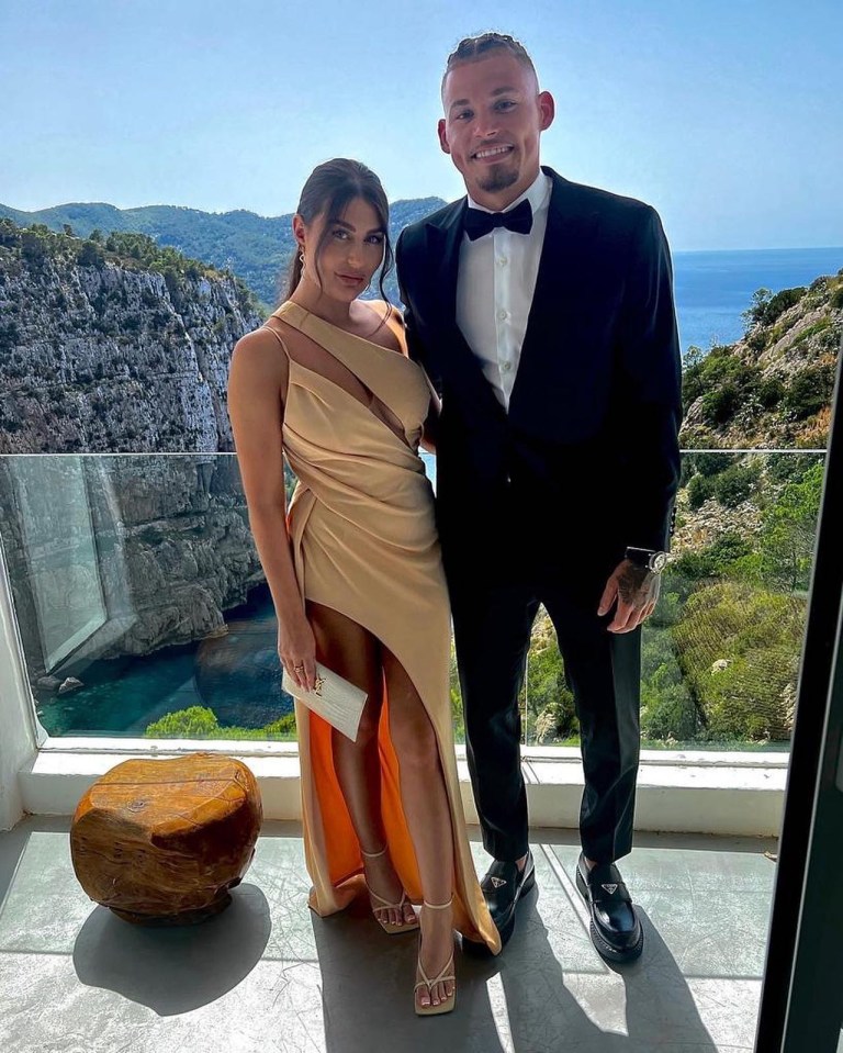The smart duo get dressed up for Liam Cooper's big day