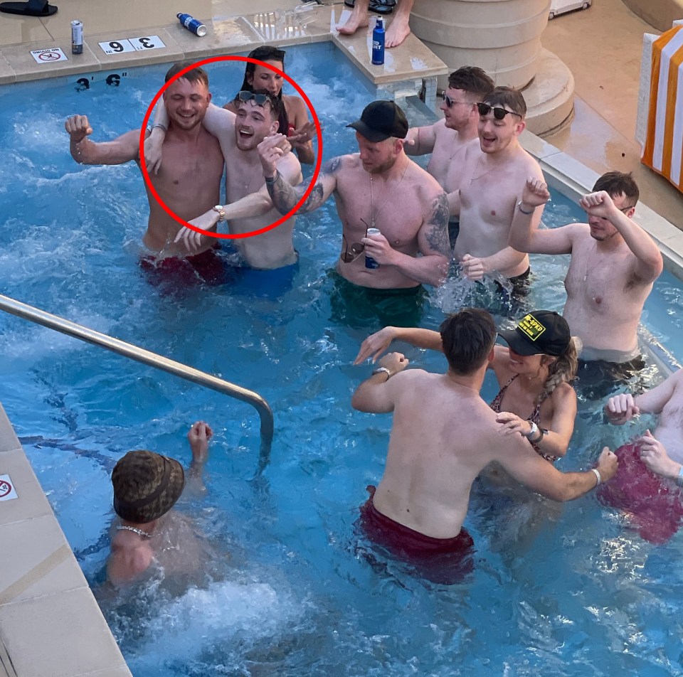 Grealish (bottom) was snapped a few feet away from Liverpool ace Andy Robertson