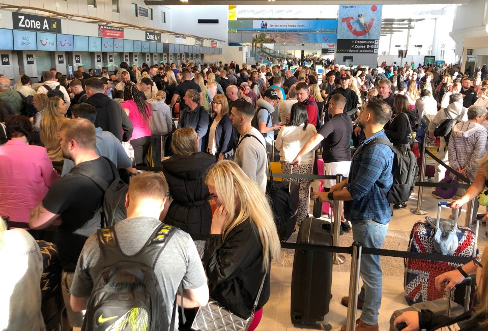 This morning, huge queues of holiday-makers waited patiently at Manchester Airport