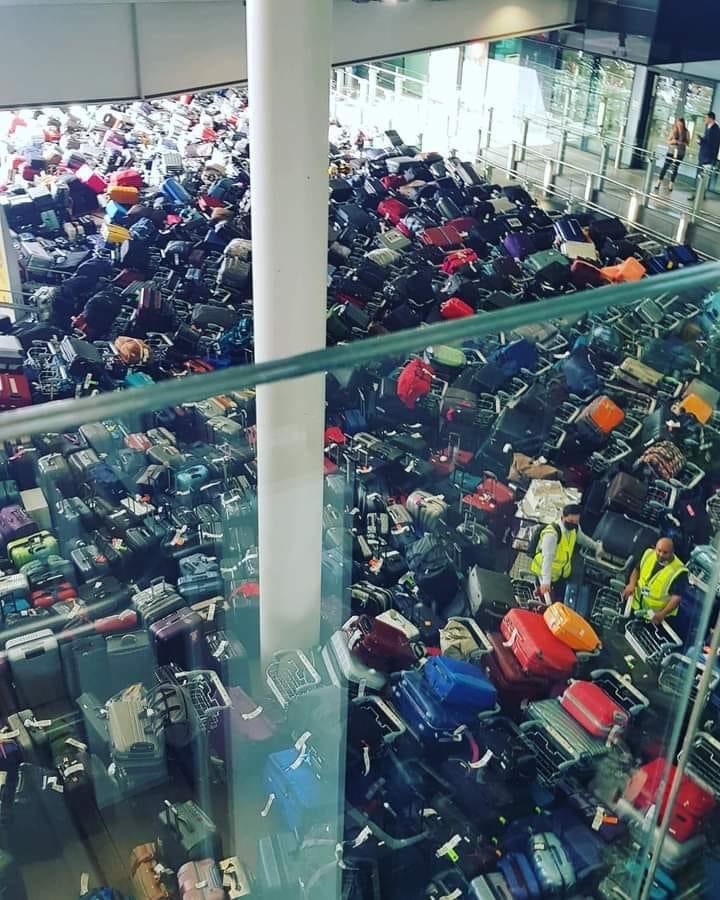 Huge piles of luggage have been spotted at airports as chaos continues