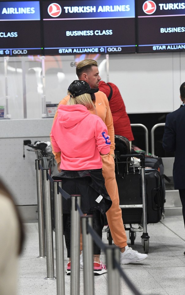 The pair pulled up at the Business Class check-in
