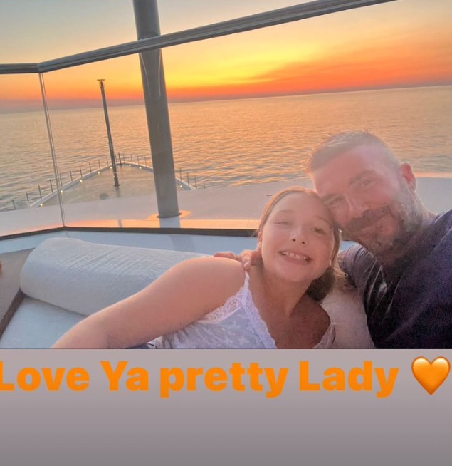 The doting dad enjoyed the sunset with daughter Harper