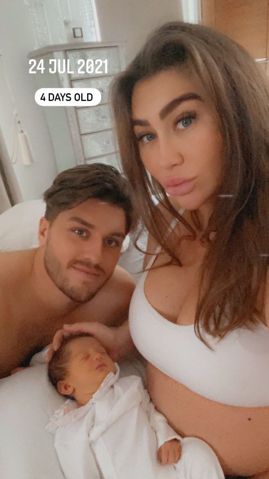 Lauren and Charles Drury with their first baby Larose