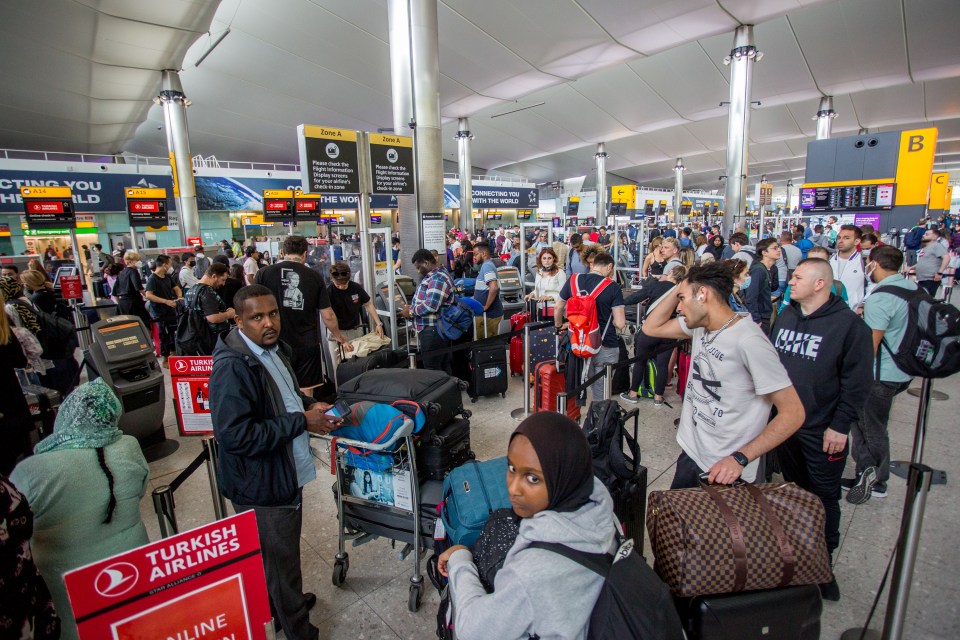 Passengers pictured at Heathrow Airport where the travel chaos looks set to continue