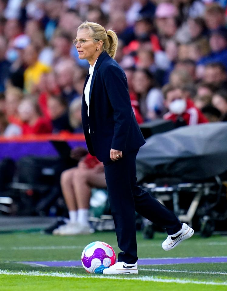 Wiegman completed her stylish look with a pair of white Nike trainers