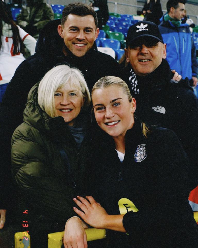 Her supportive mum, dad and brother have been seen in the stands cheering Russo on