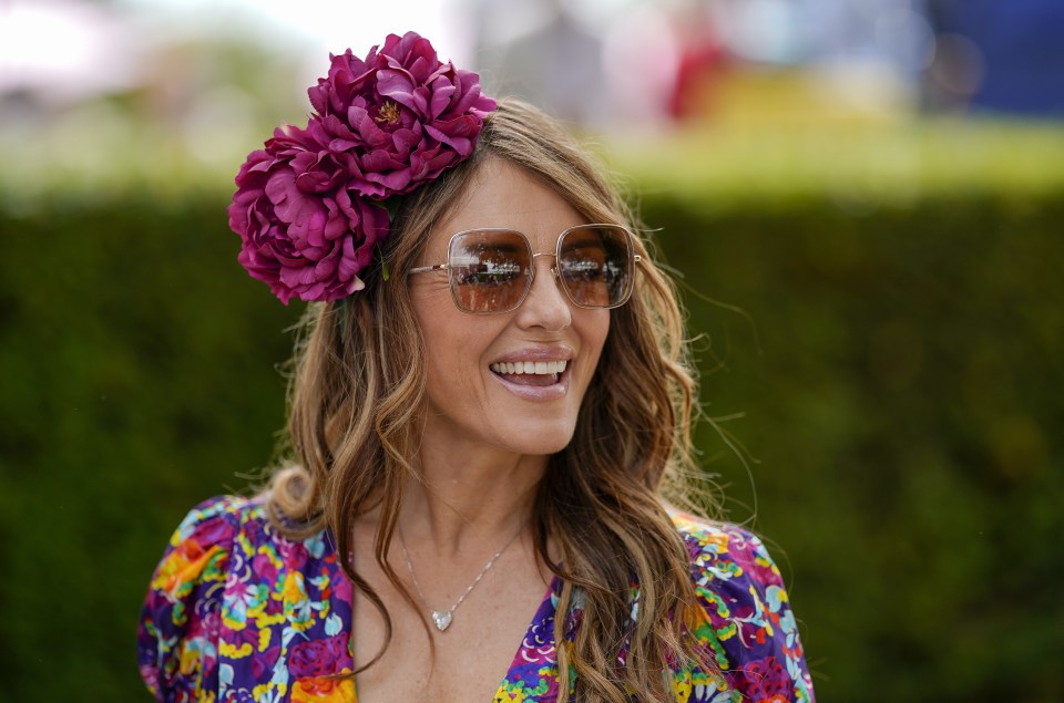 The actress paired her outfit with flowers in her hair