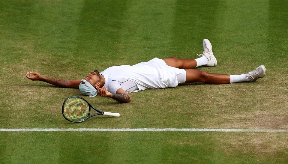 Nick Kyrgios fell to the turf as he booked his spot in a first Grand Slam semi-final