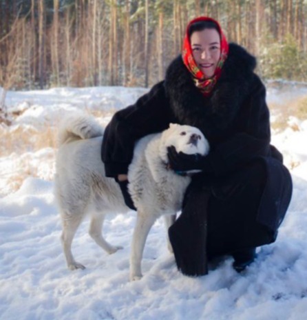 Miracle Siberian husky Belyi Durvived the shelling and stayed alive while its family fled from Russia for four months, Kateryna with pet pictured in July pre-war