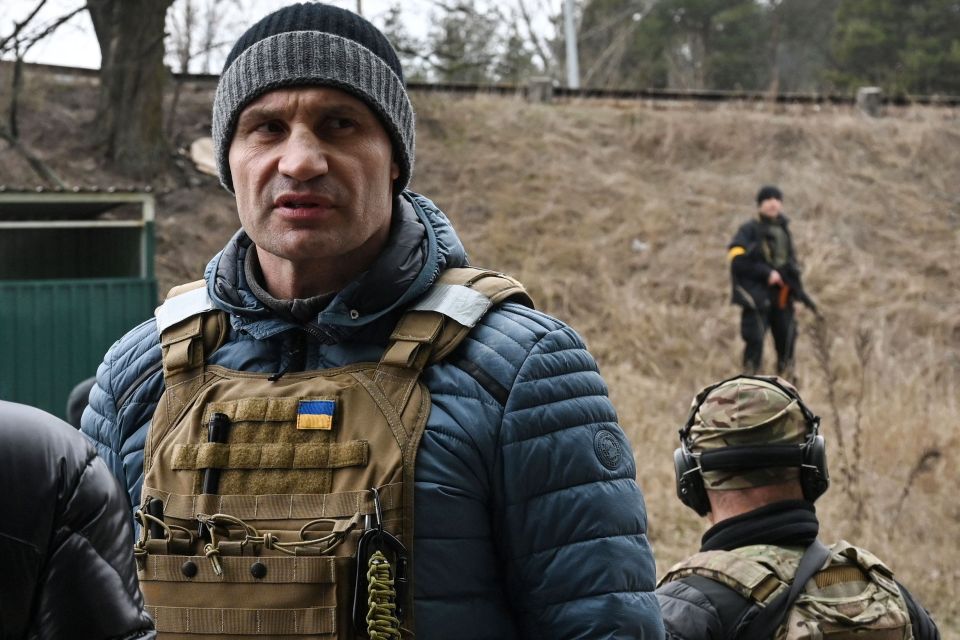 Klitschko pictured wearing military protection earlier this year while defending Kyiv