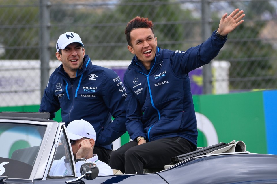 Alex Albon, right, sits with team-mate Nicholas Latifi on a tour of Canada's F1 track