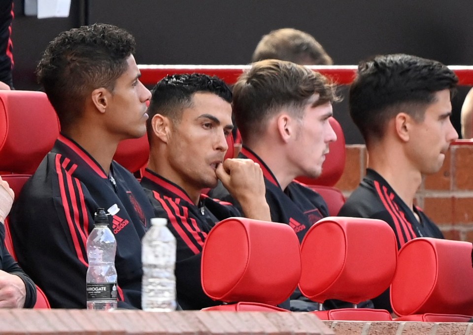 Ronaldo looks on from the bench as United go 2-0 down