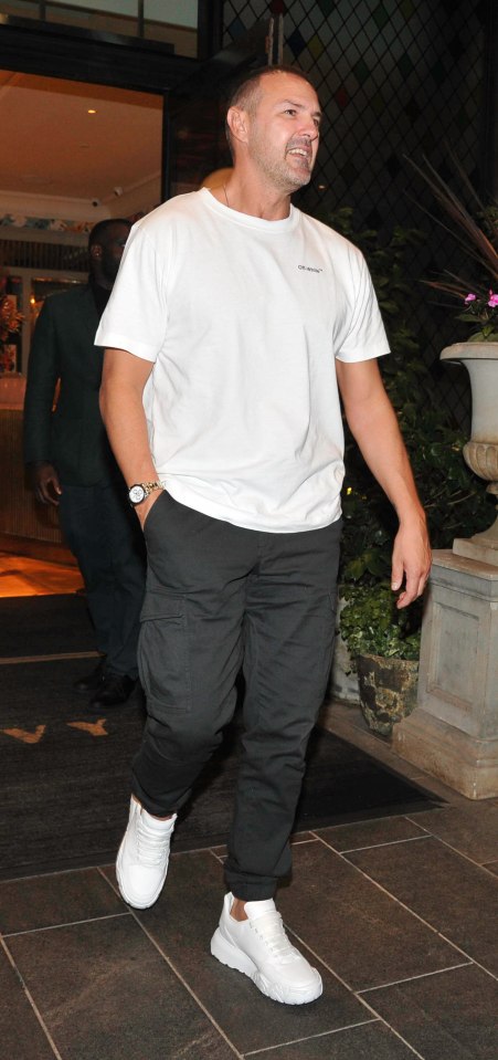Paddy looked very laid back in trainers and a T-shirt
