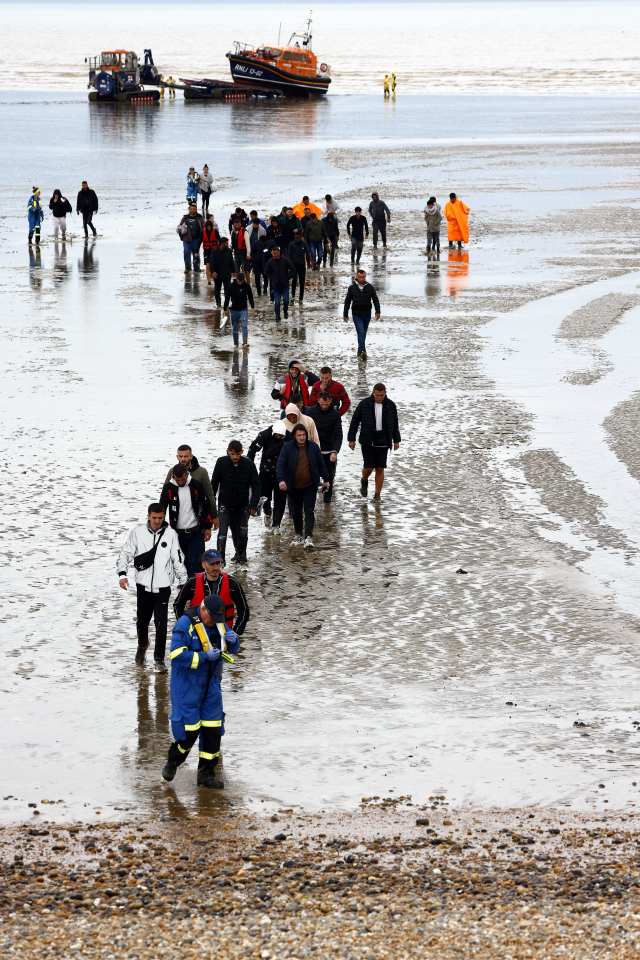Dozens of migrants were escorted off a beach yesterday, amid a shocking report