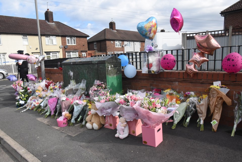 Flowers and tributes at the scene in Knotty Ash