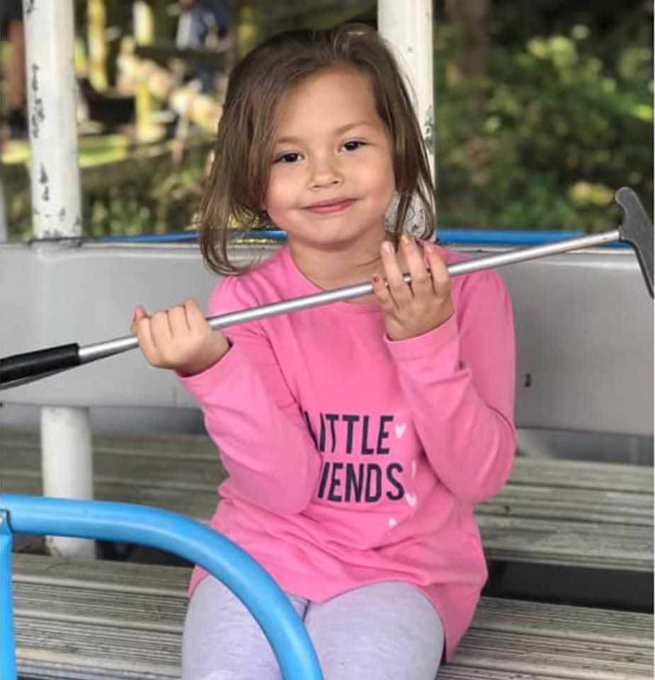 She was cowering behind her mum when the gunman opened fire