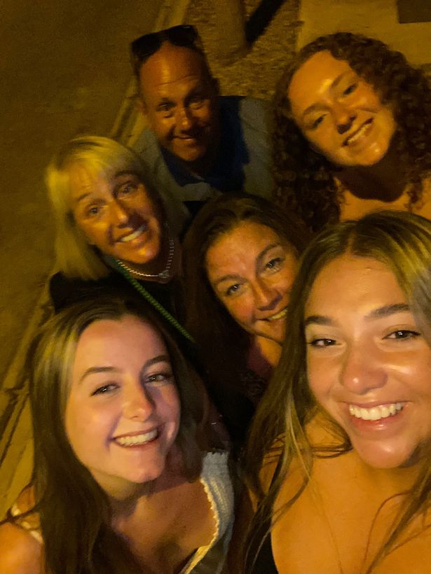 Clare and Gary (back left and ctr) had been on holiday in Spain when the offence apparently occurred