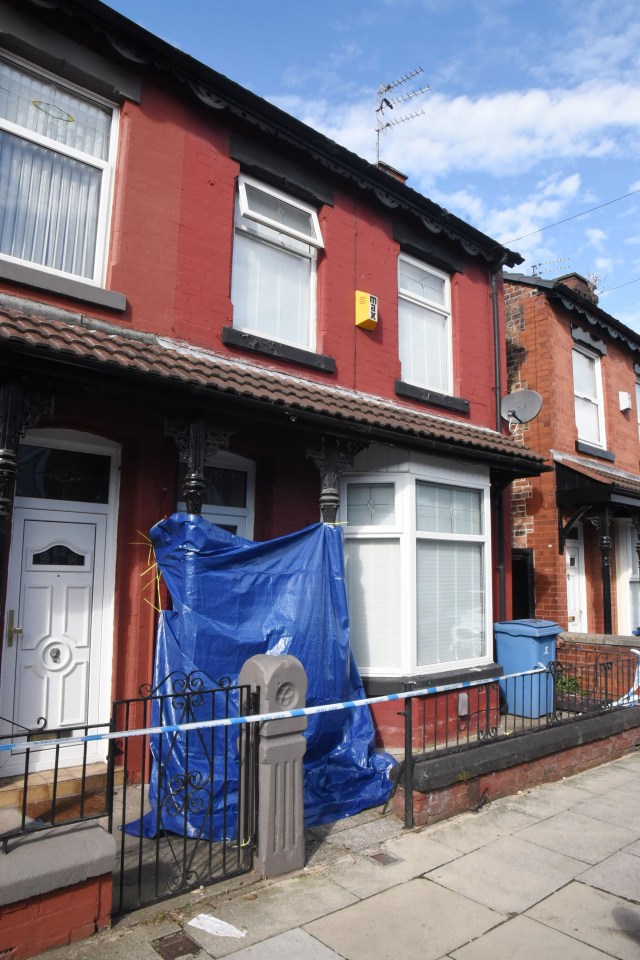 The property, pictured covered up today, where she was shot