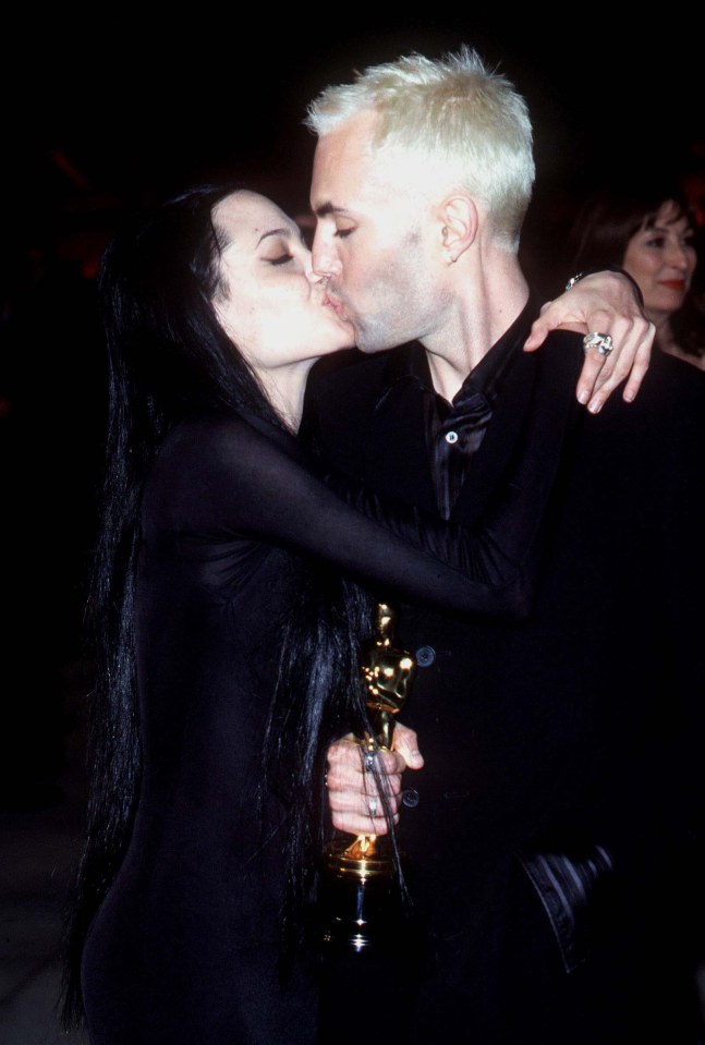 Angelina Jolie said fans criticising her kiss with her brother were "pathetic"