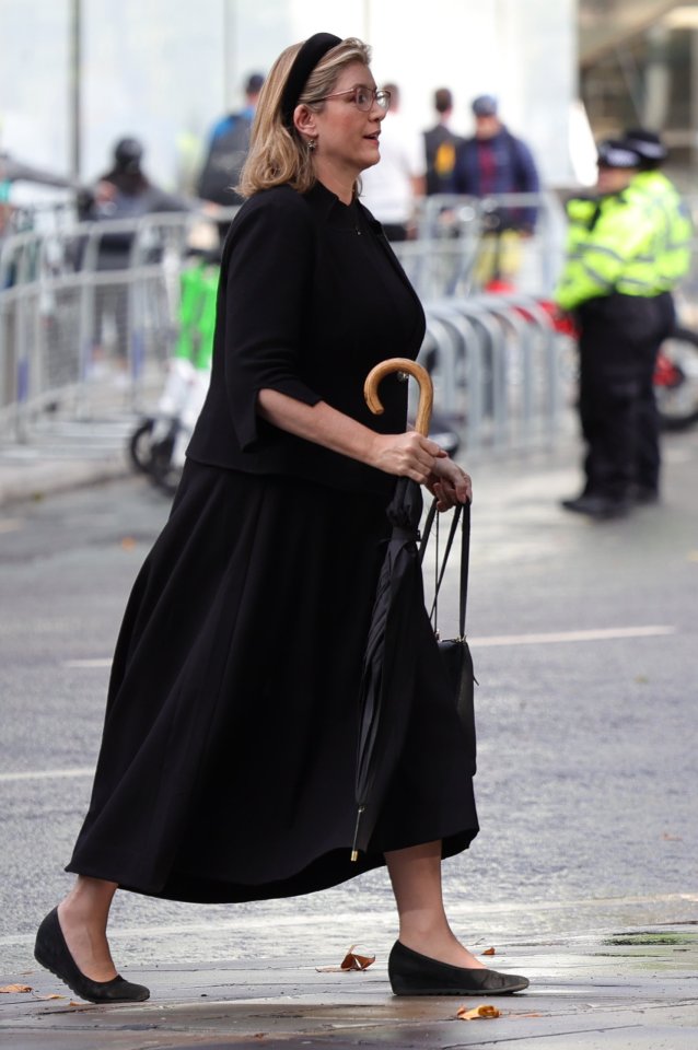 Penny Mordaunt was seen walking into the service looking overwhelmed with emotion