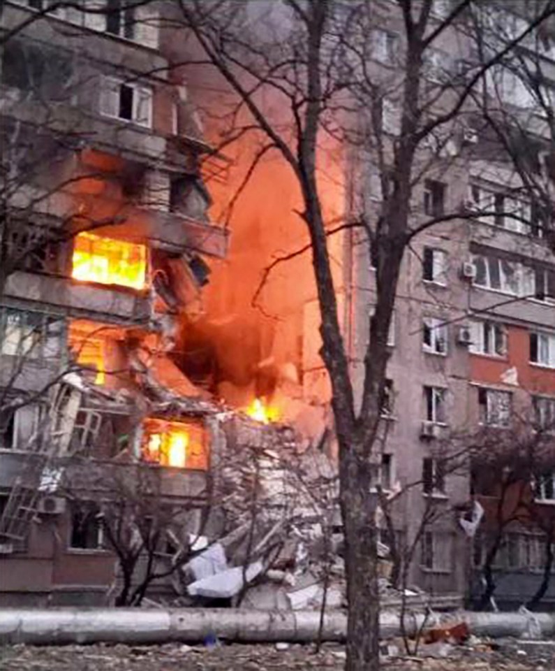 The obliterated apartment block in Mariupol where Pavel lived with his partner Olga and daughter Nastya