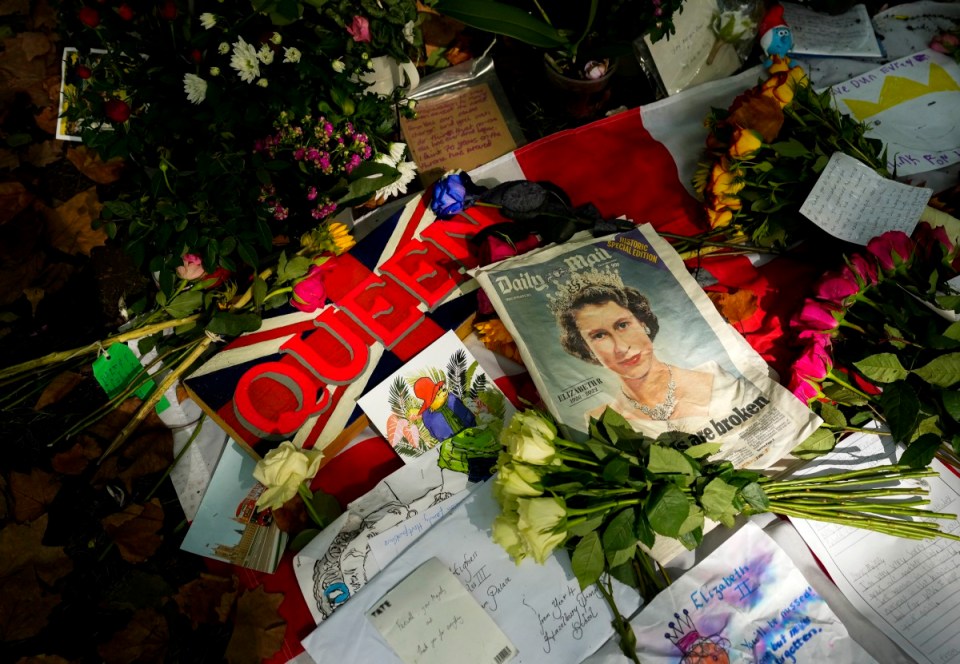 Thousands of people have left gifts and flowers outside Buckingham Palace in commemoration of The Queen's death.
