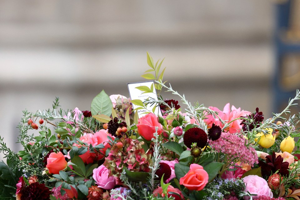 Flowers lie on the coffin of Britain’s Queen Elizabeth on the day of her funeral
