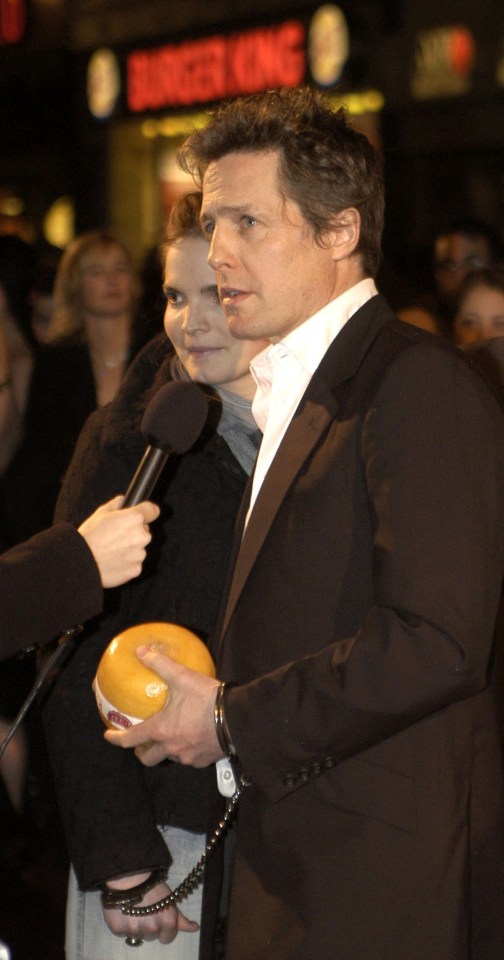 A female journalist handcuffed herself to Hugh Grant