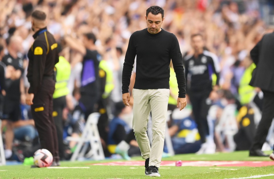 Xavi watched his Barca side lose to rivals Real Madrid on Sunday