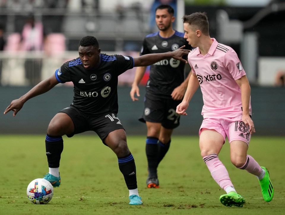 Harvey Neville, right, made his MLS debut