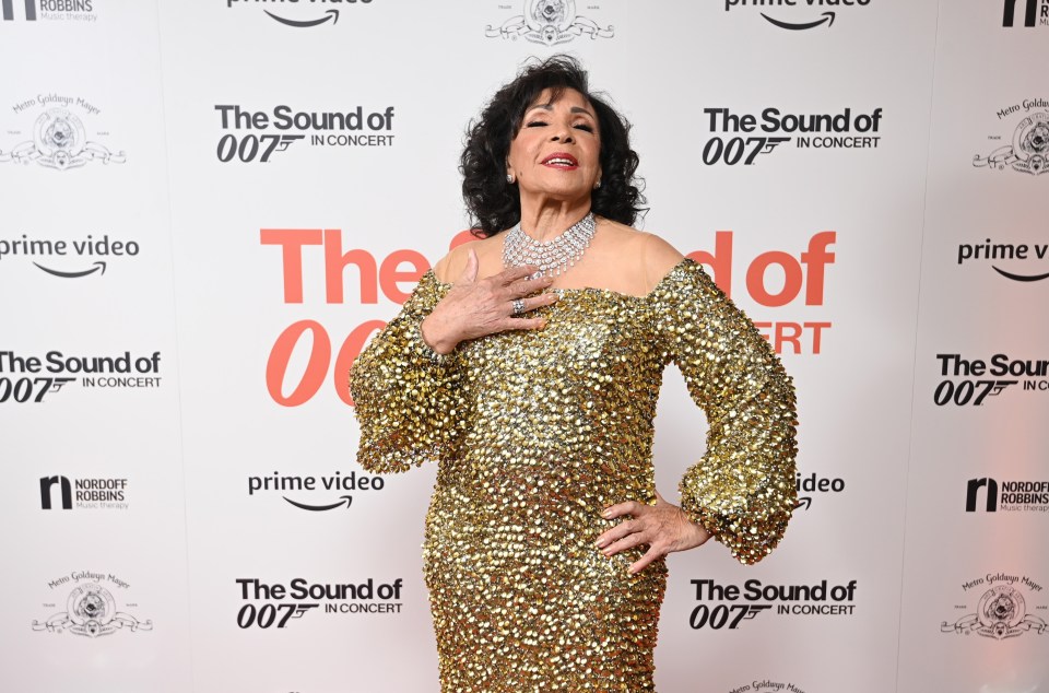 The 85-year-old wore a shoulderless gold glittering dress