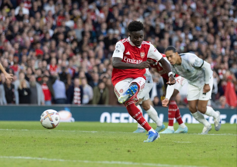 Bukayo Saka fires in to seal Arsenal's 3-2 win over Liverpool on Sunday