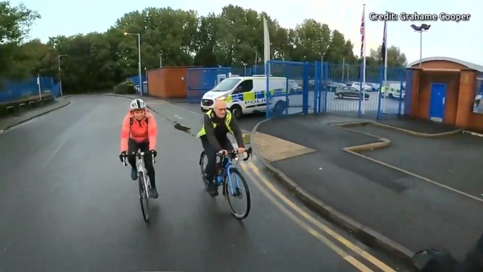 The cyclists were riding two abreast along the road