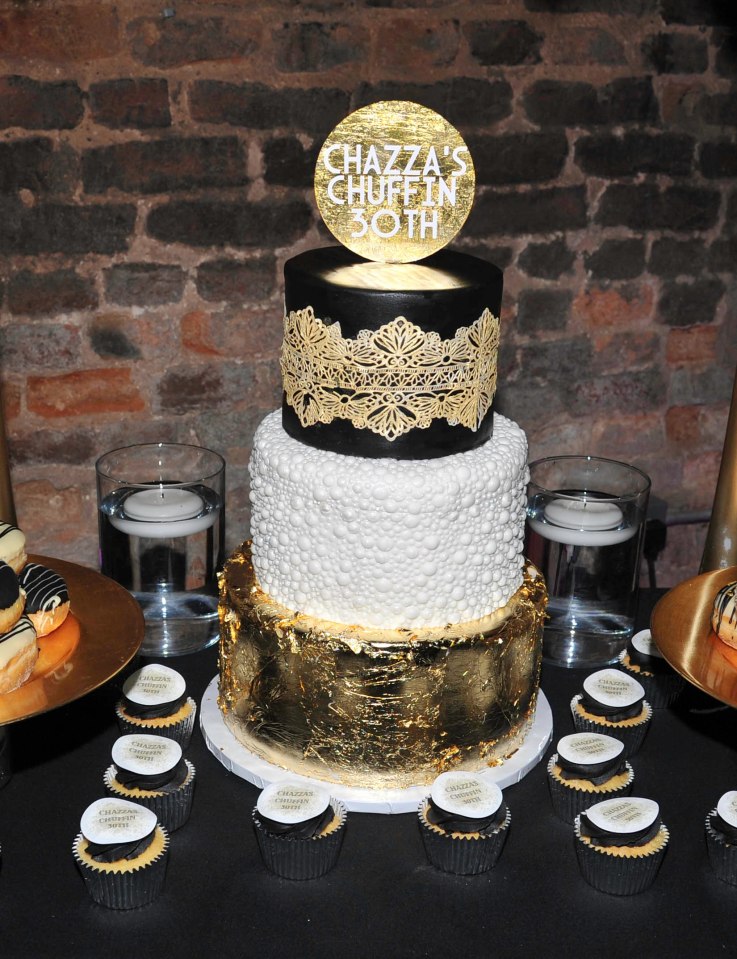 Charlotte had a snazzy birthday cake and cupcakes for the bash