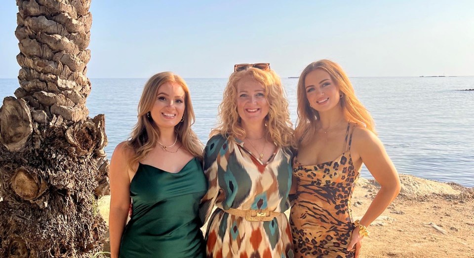 Maisie posed with her mum and sister on the foreign getaway