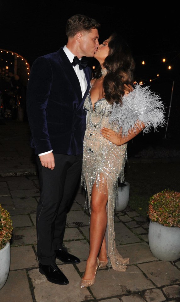 Charlotte and fiance Matt packed on the PDA