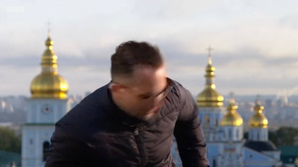 BBC correspondent Hugo Bachega ducks for cover while live on air this morning as a missile struck the Ukrainian capital