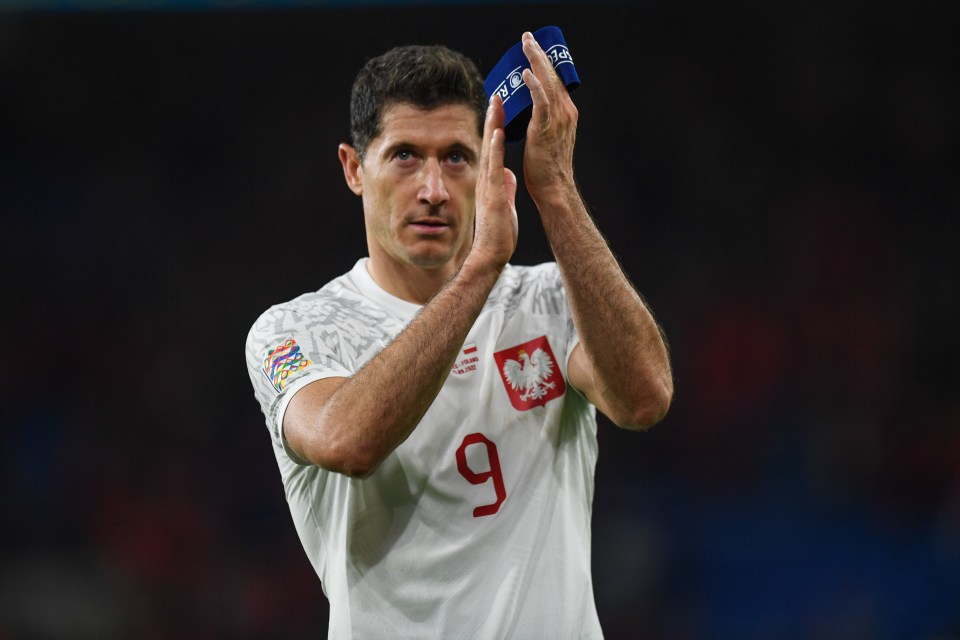 Robert Lewandowski applauding Poland fans