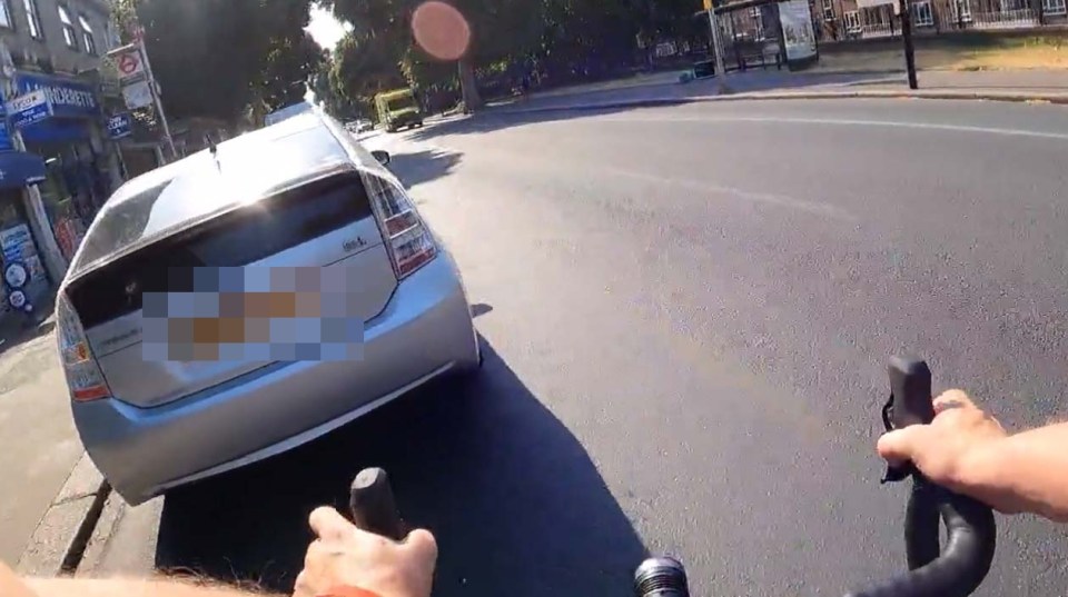 Video footage shows the moment the cyclist confronted the driver