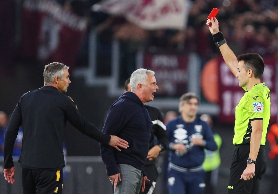 Referee Antonio Rapuano shows Jose Mourinho a red card