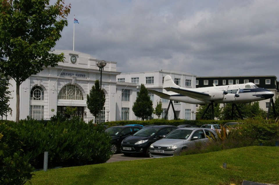 Airport House is recognisable by the de Havilland Heron mounted out the front