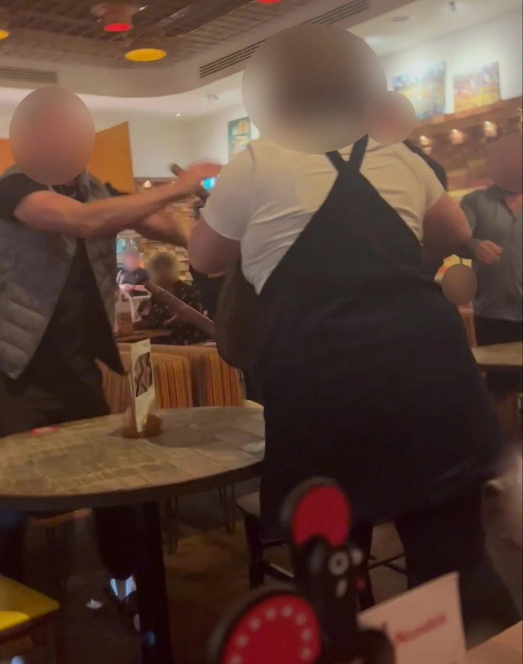 Both parties were kicked out of the restaurant and the police were called