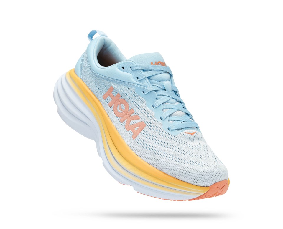 a pair of blue and orange hoka running shoes